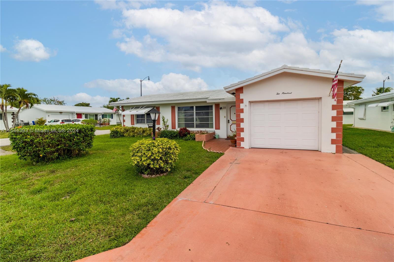 LOVELY 2-bedroom, 2-bath single-family home with garage in a private 55 + golf Leisureville Communit