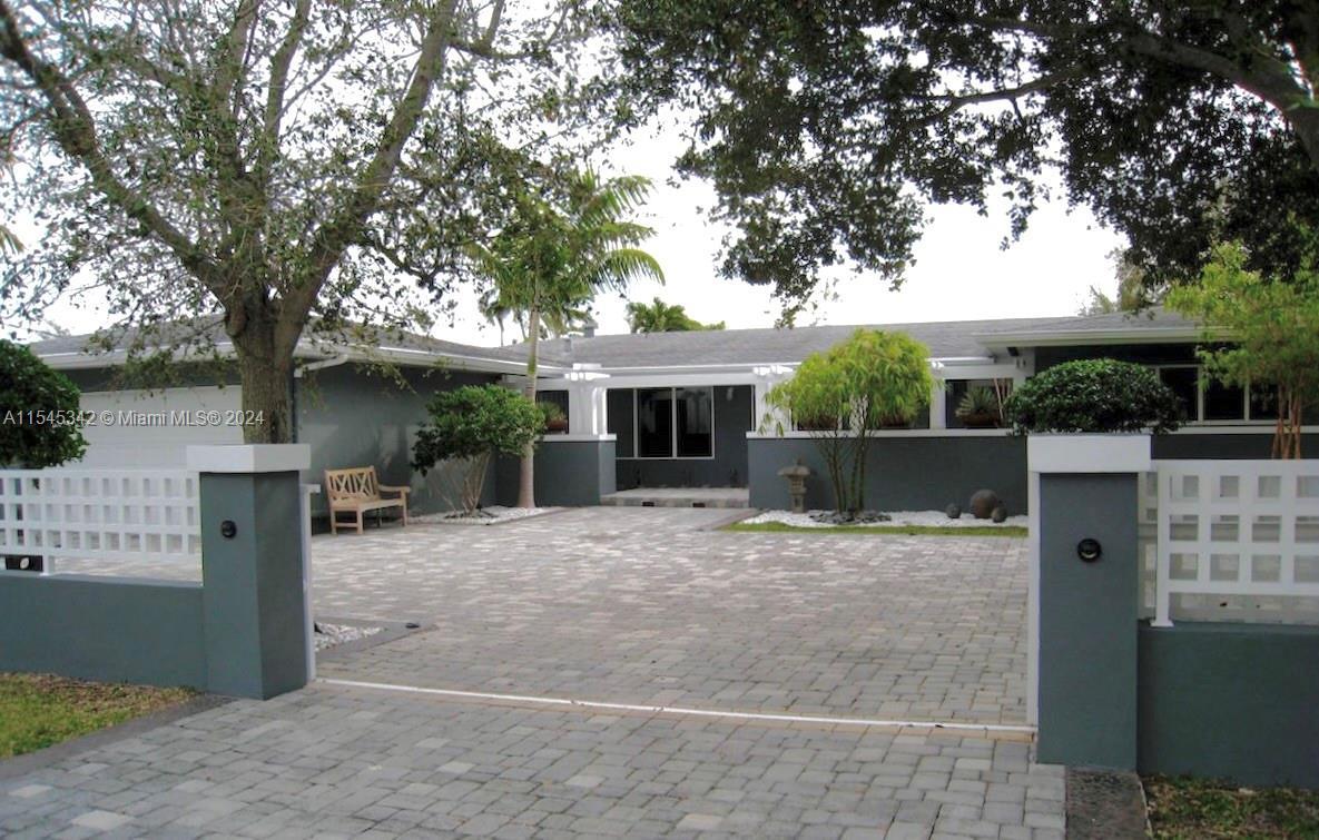 Walk to Pinecrest Elementary! Beautiful modern family home on a quiet street. Gated and tastefully l