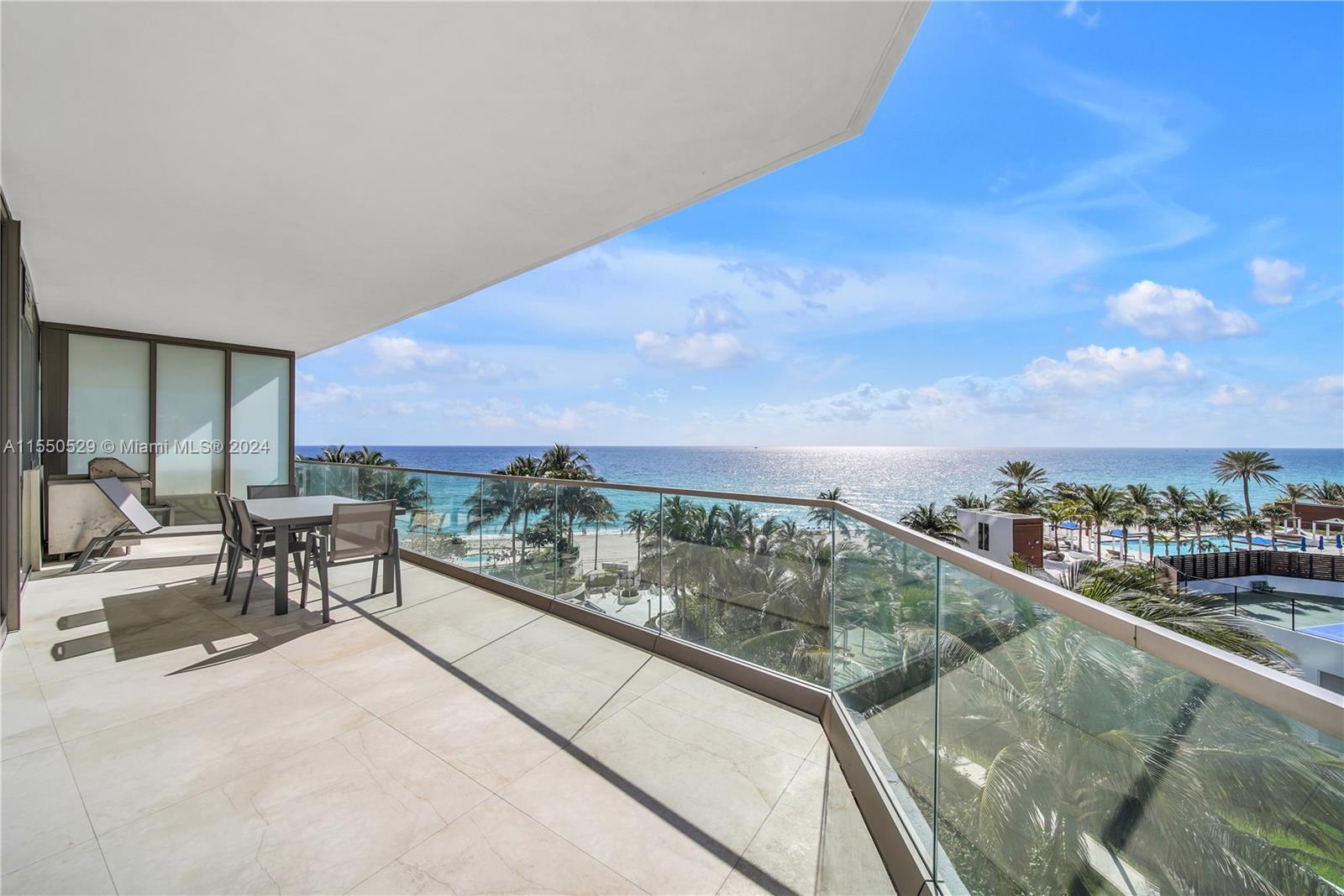 Experience direct oceanfront luxury in this stunning 2 bed+den, 2.5-bath corner residence at Residen