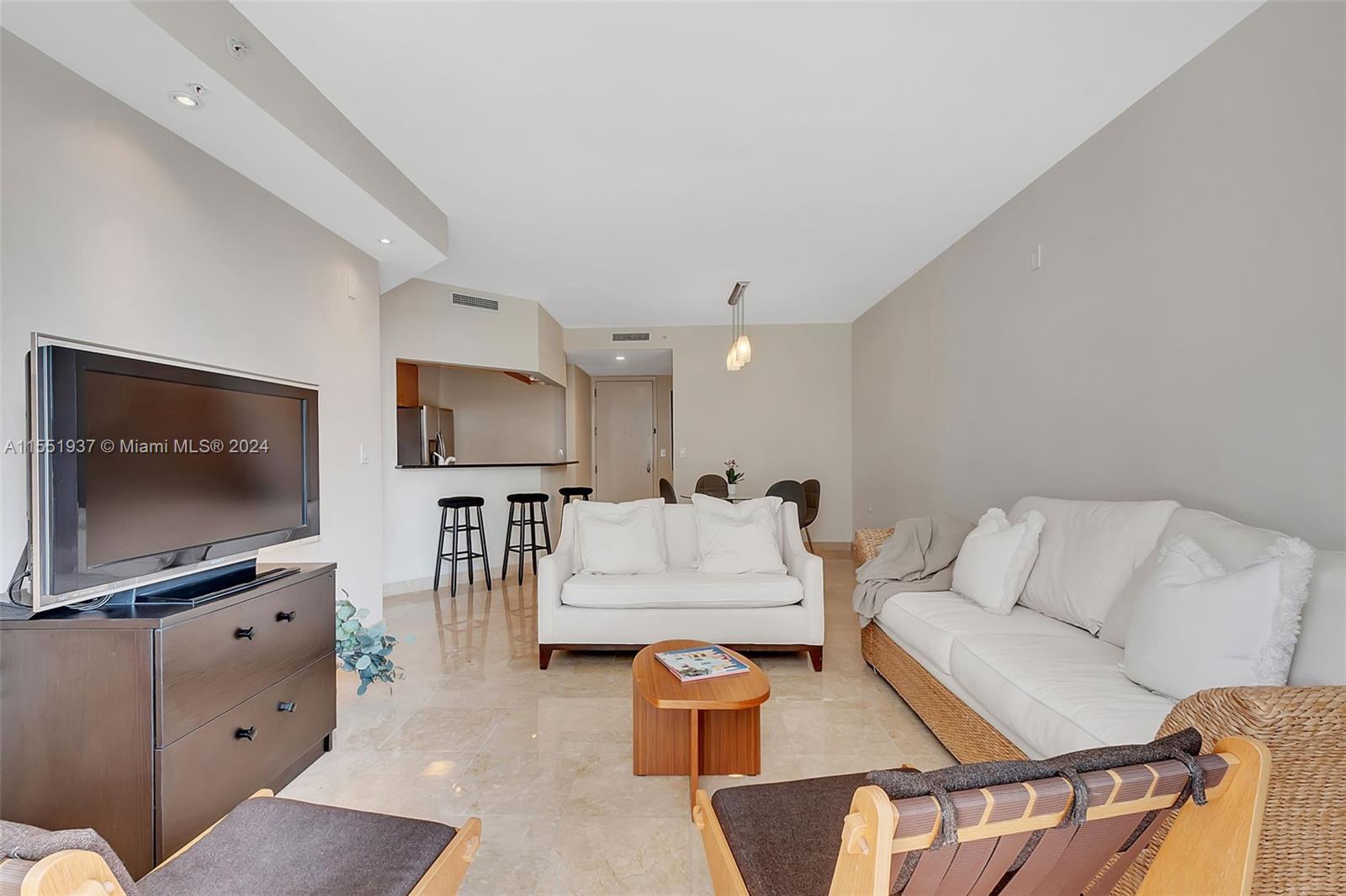 Bright and cozy unit with renovated master bathroom, stainless steel appliances and impeccable condi