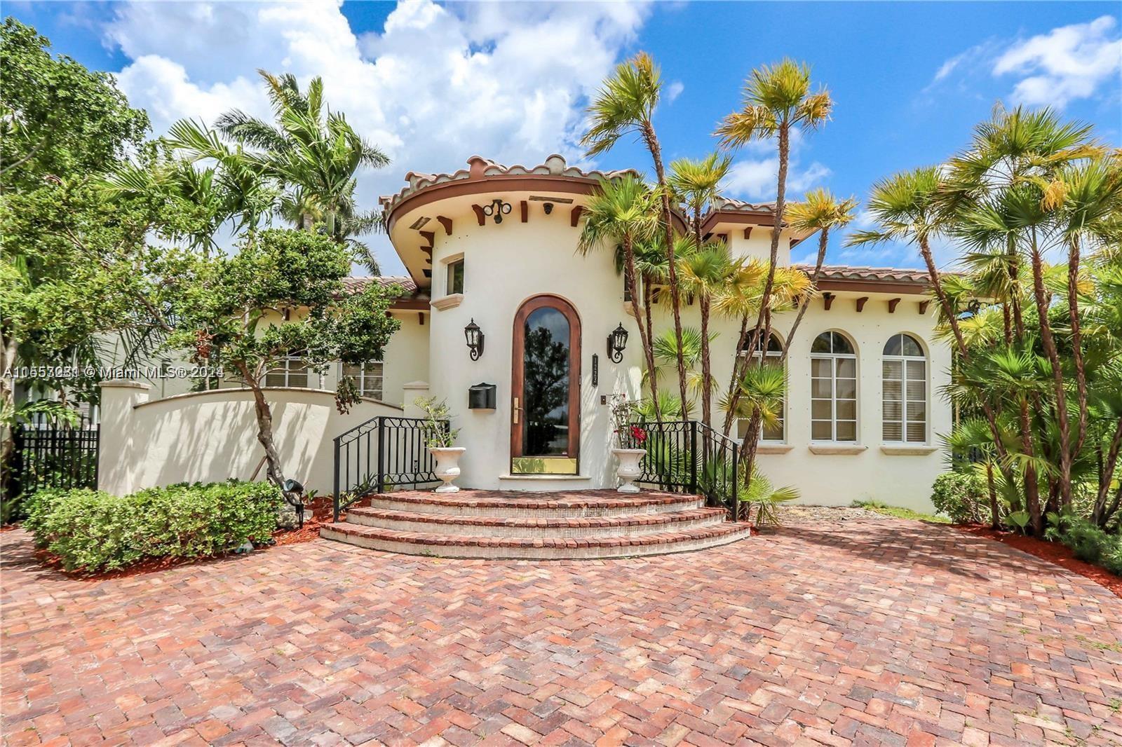 MEDITERRANEAN STYLE HOME WITH GORGEOUS LAKE VIEW. SOARING 12 FT CEILINGS THROUGHOUT THE HOUSE. OPEN 