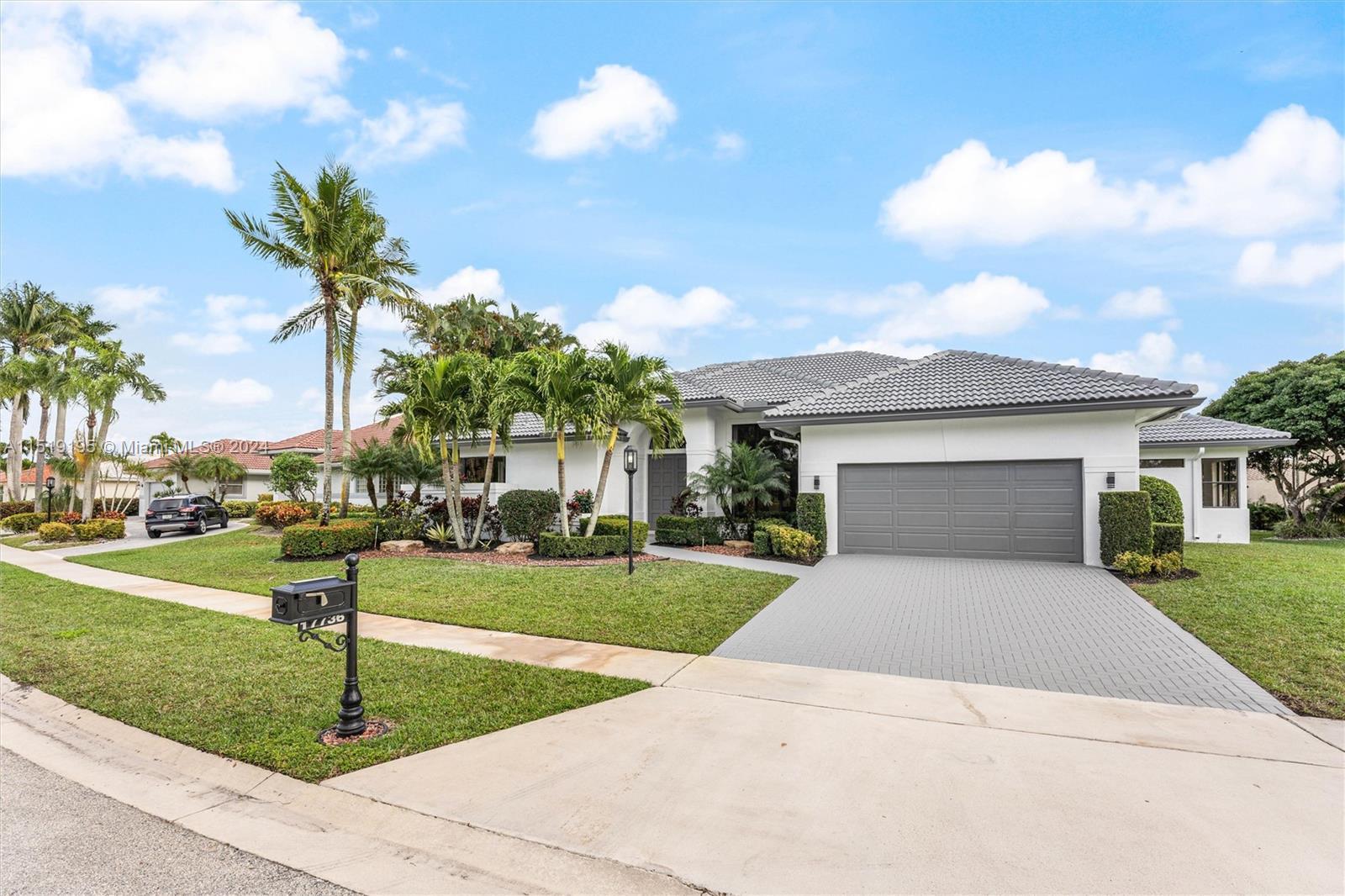 Stonebridge country club in West Boca Raton fully remodeled and stunning 4 bedroom showcase home wit