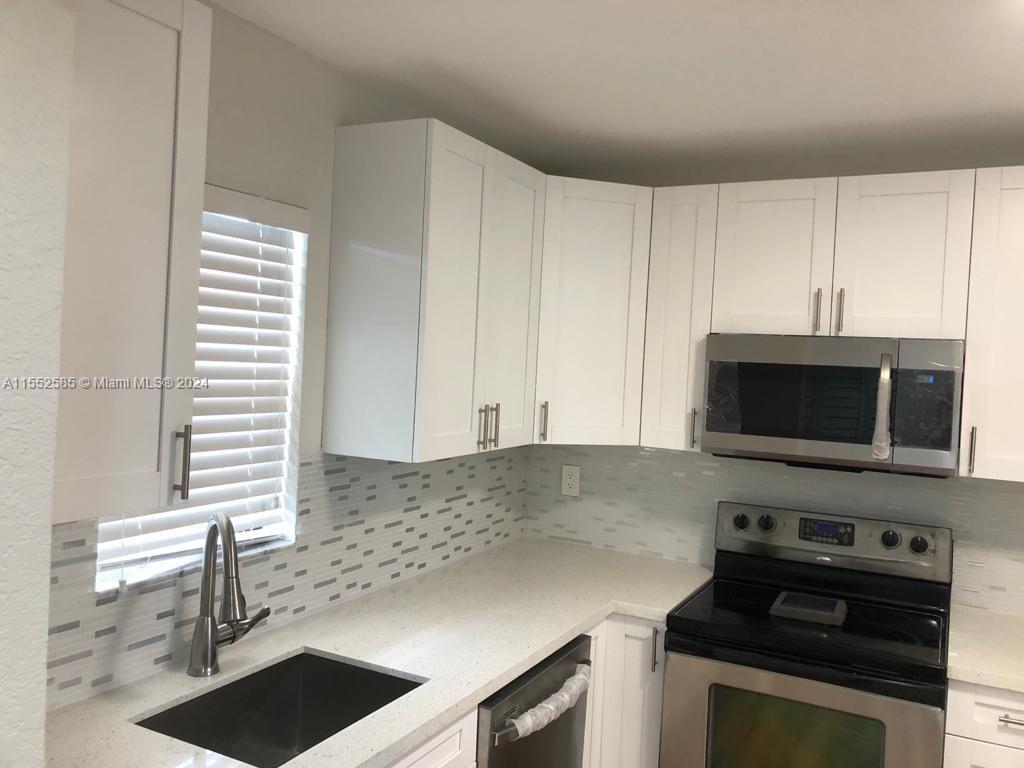 Centrally located, beautifully renovated 2 Bed 2 Bath Condo on 3rd floor with elevators in the Bldg.