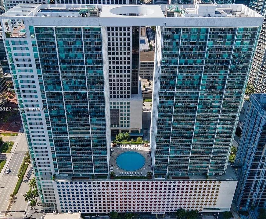 Bright & updated 2/2 CORNER unit with water & city views at 500 Brickell! This FURNISHED apartment h