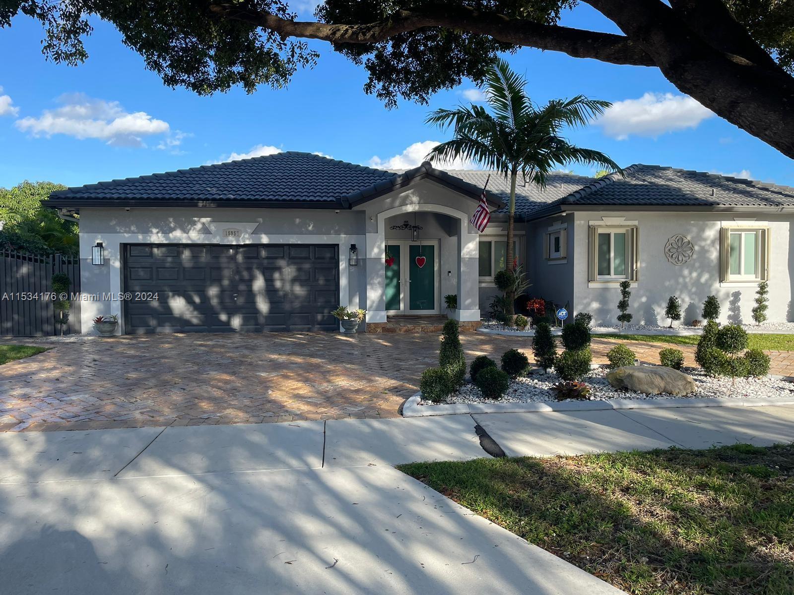 Beautiful house in Miami Lakes, nice travertine circular driveway, brand new approaches, fully gutte