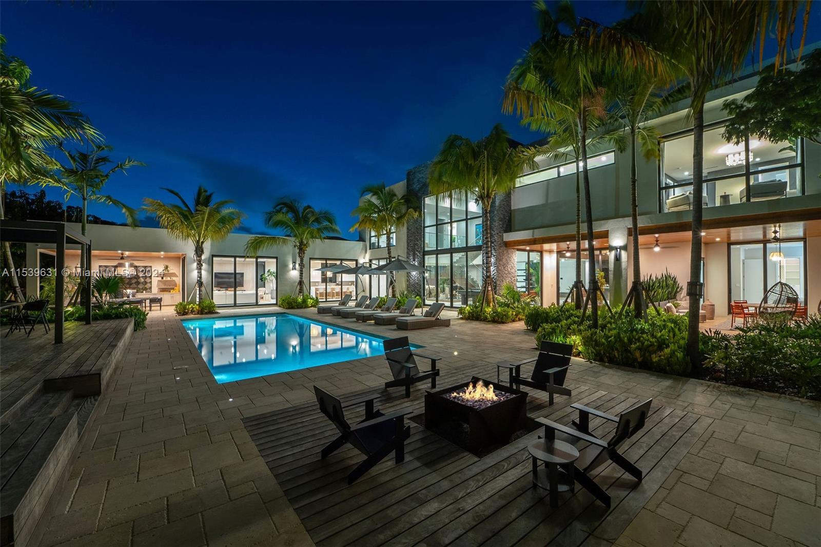 Tropical Modern Villa – A masterpiece set on one of the most prestigious roads in Pinecrest. A signi