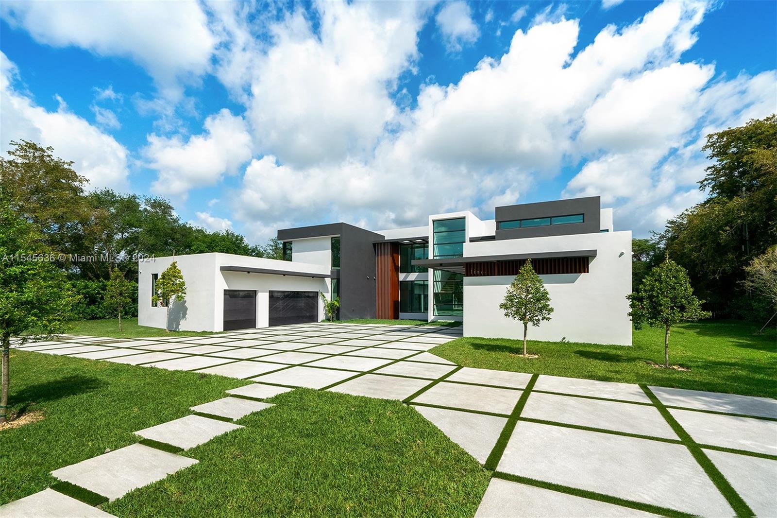 Embrace modern elegance in this 2-story luxury home on nearly an acre, ready for immediate occupancy