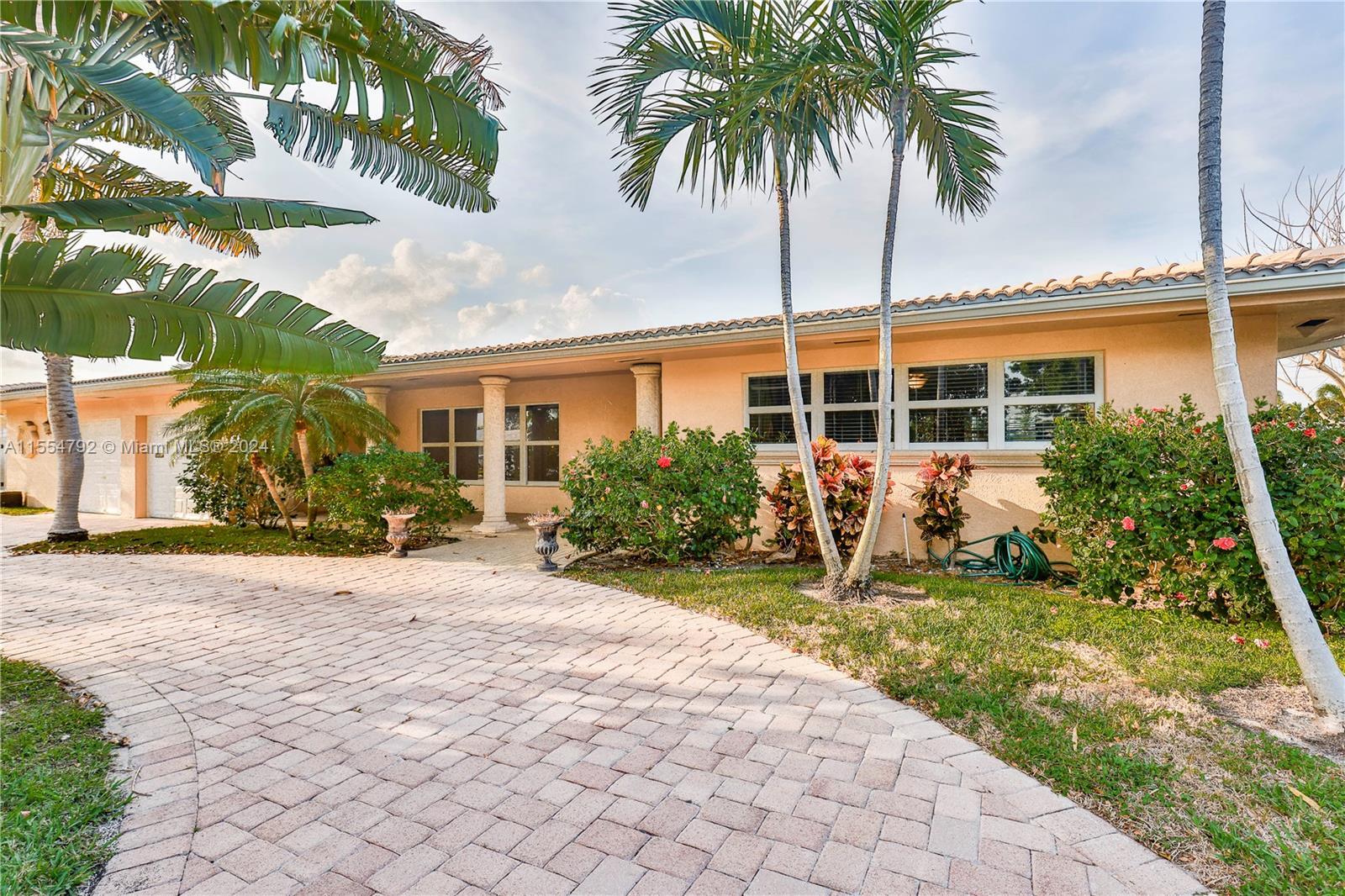 Water front oversize heated pool home with huge backyard in beautiful Lighthouse Point. This 4 bedro