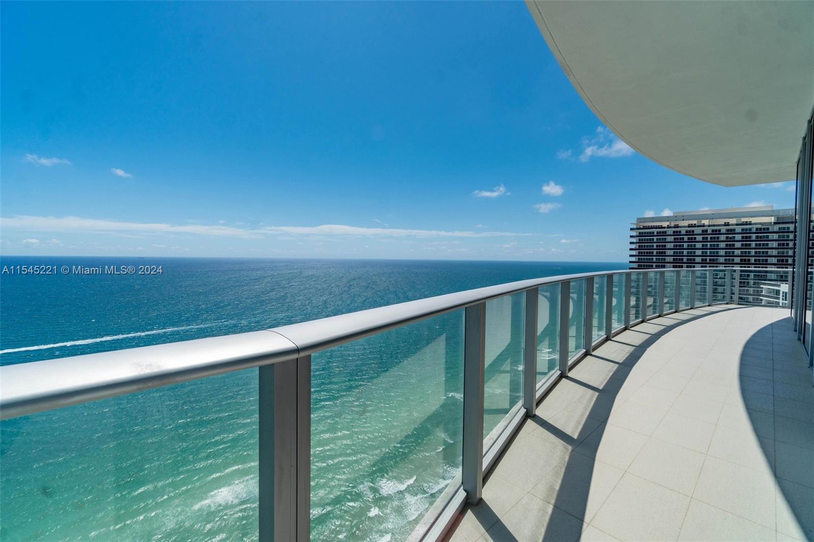 Introducing unparalleled coastal luxury living in this oceanfront PENTHOUSE! This corner unit boasts