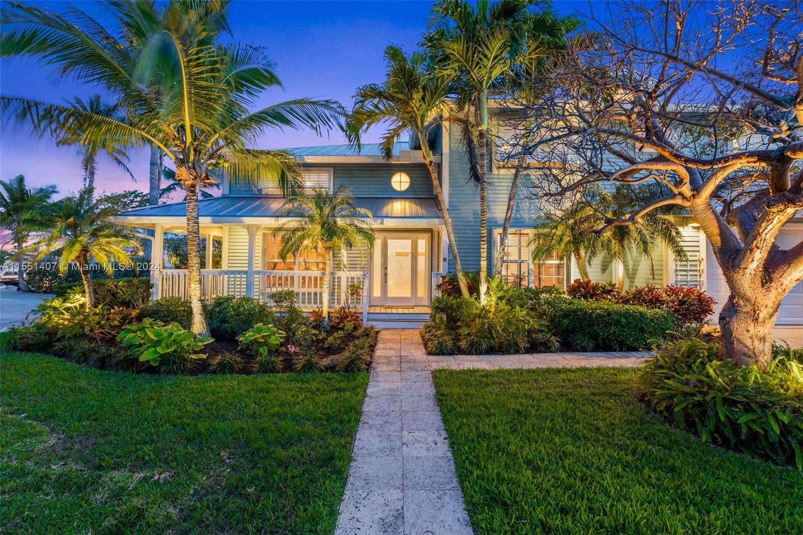 Stunning Key West style residence nestled along the tranquil waters of central Palm Beach County. Bo