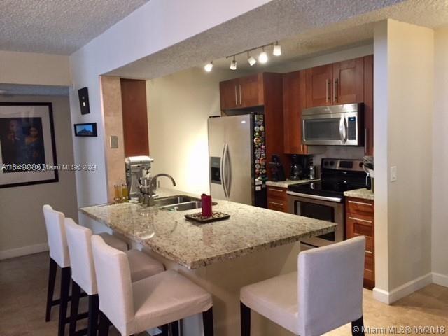 VERY NICE UNIT UPDATED 2  BEDROOMS AND 2 COMPLETELY BATHROOMS , WASHER AND DRYER INSIDE , SMALL PATI