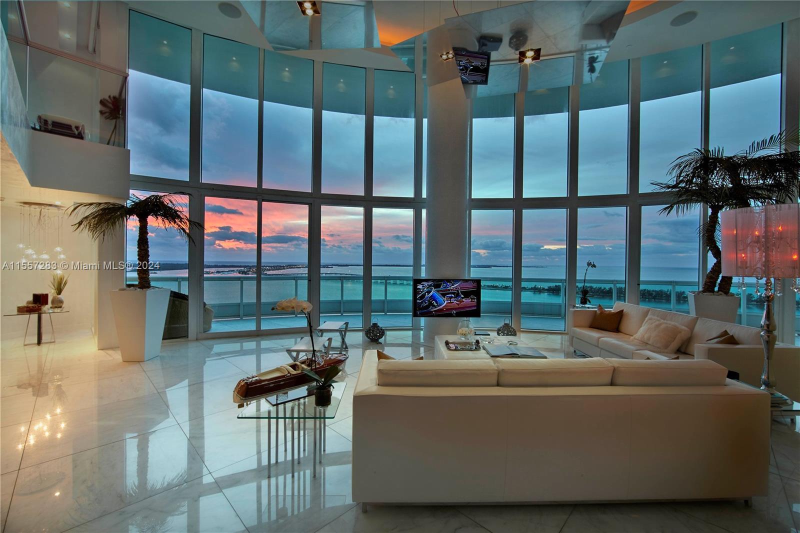 Modern and elegant 2 story unit with double height ceiling at Santa Maria in Brickell. 4BR/4.5BA tot