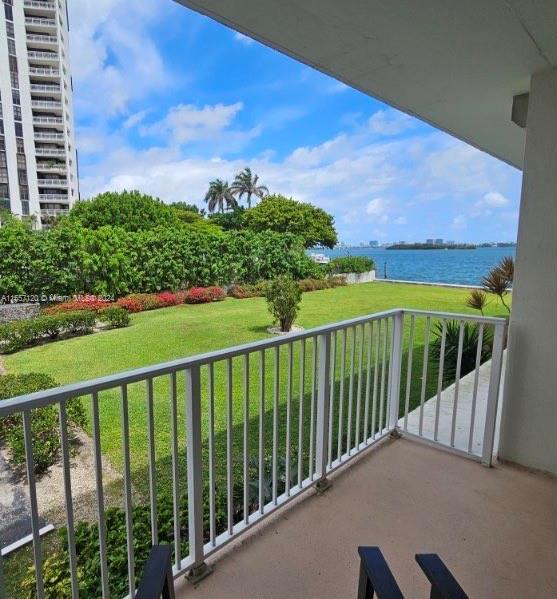 STUNNING BAY VIEW UNIT! This spacious Miami Shores condo offers a secure community with bay-front vi