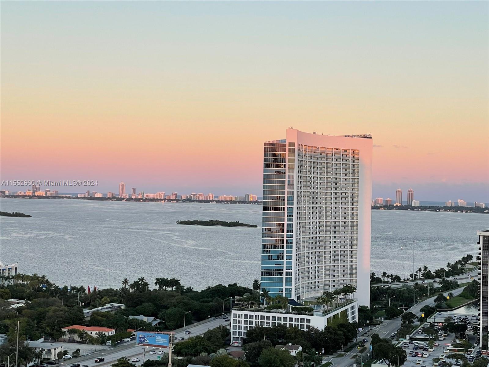A high-floor Designer unit with oversized terrace w/views of the Bay, Design District & Florida skyl