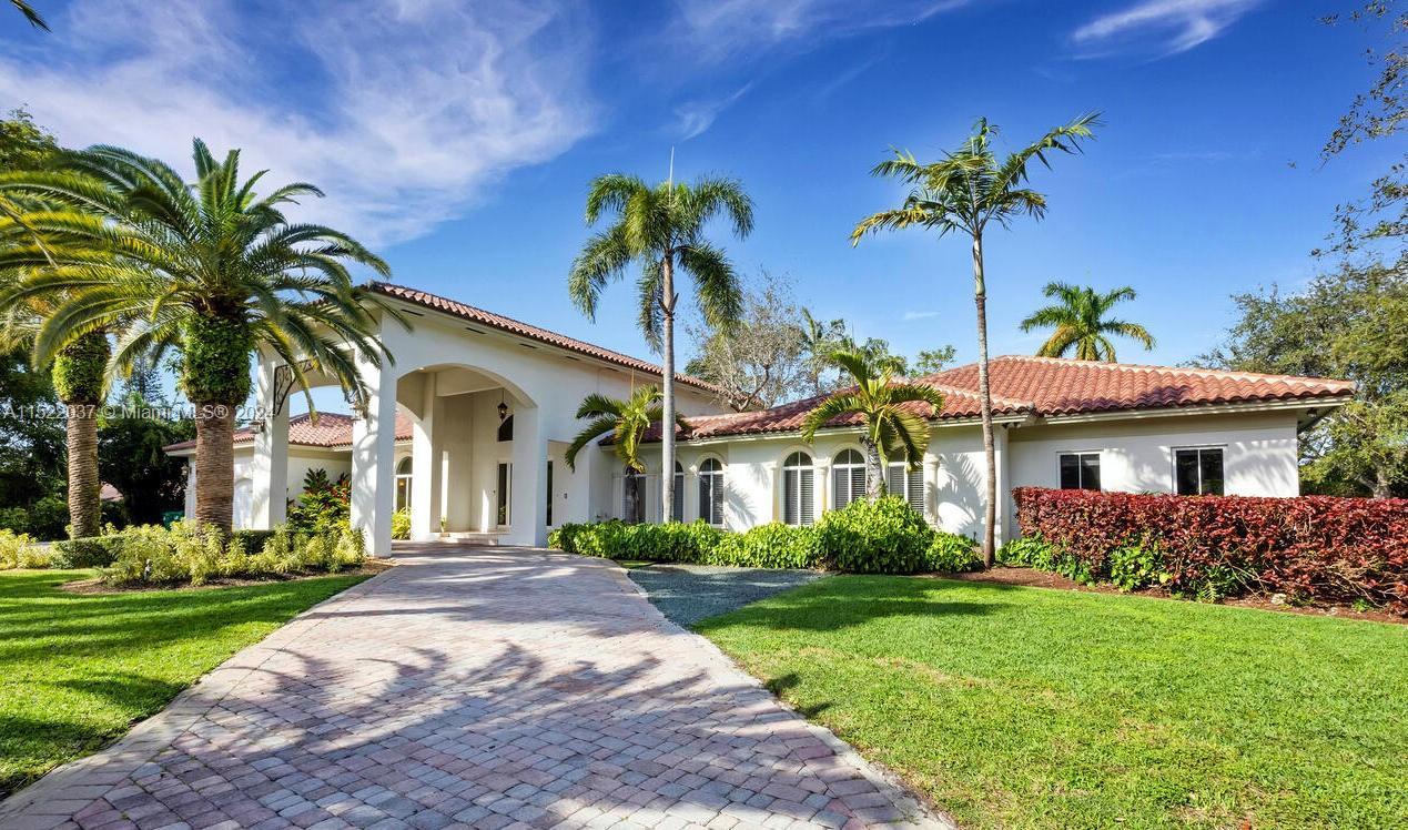 Built in 2002, this fabulous single-story 6BR/6.5BA Pinecrest estate is a gem! The grand living room