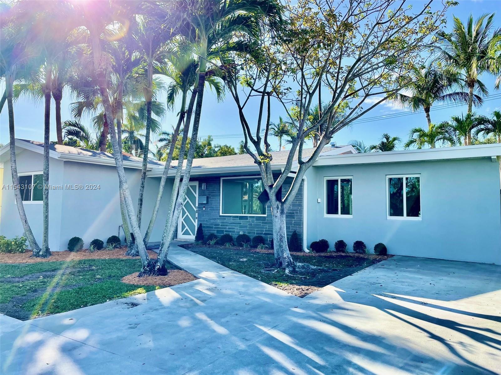 Gorgeous, updated home 3 minutes from the beach. Four bedrooms, three bathrooms, modern open kitchen