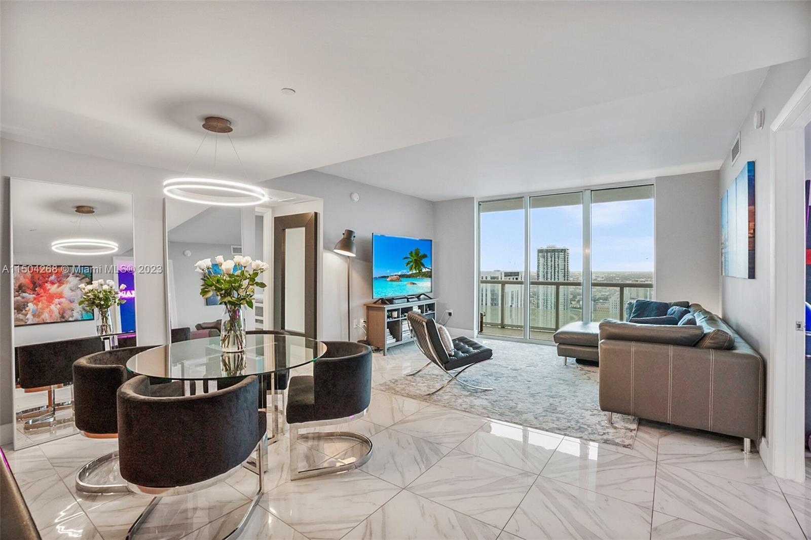 This 46th FL corner unit at 50 Biscayne features 2 Beds, 2 Baths w/ a large wraparound balcony facin