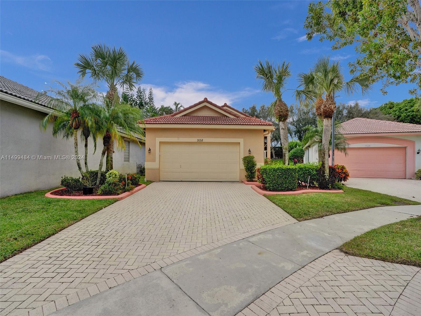 This charming one-story home is nestled in Royal Palm Beach, FL. Boasting three bedrooms and two bat