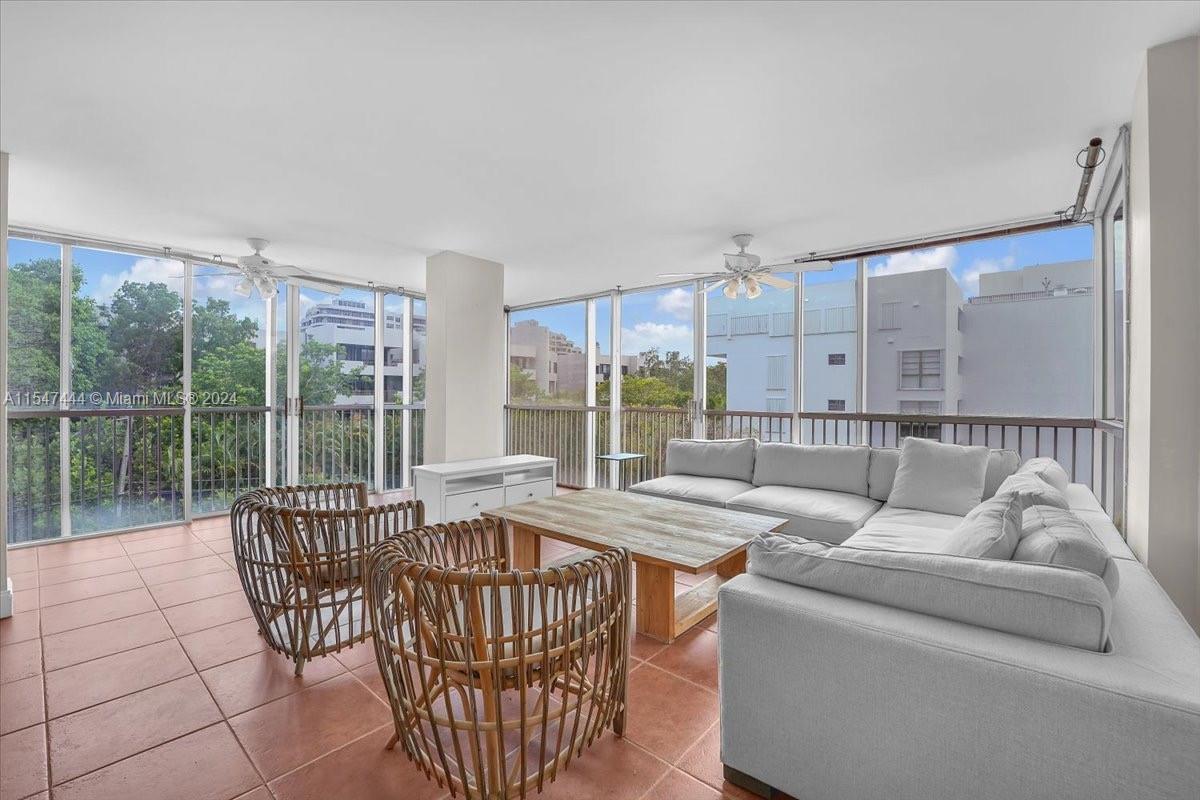 Large, bright corner apartment in desirable Key Biscayne, steps from the beach.   The unit features 