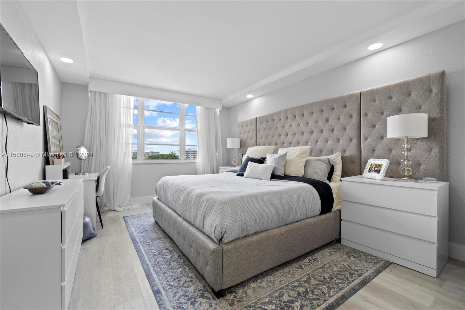 Experience modern luxury in this stunning 3-bed, 2.5-bath condo boasting a new open concept design. 