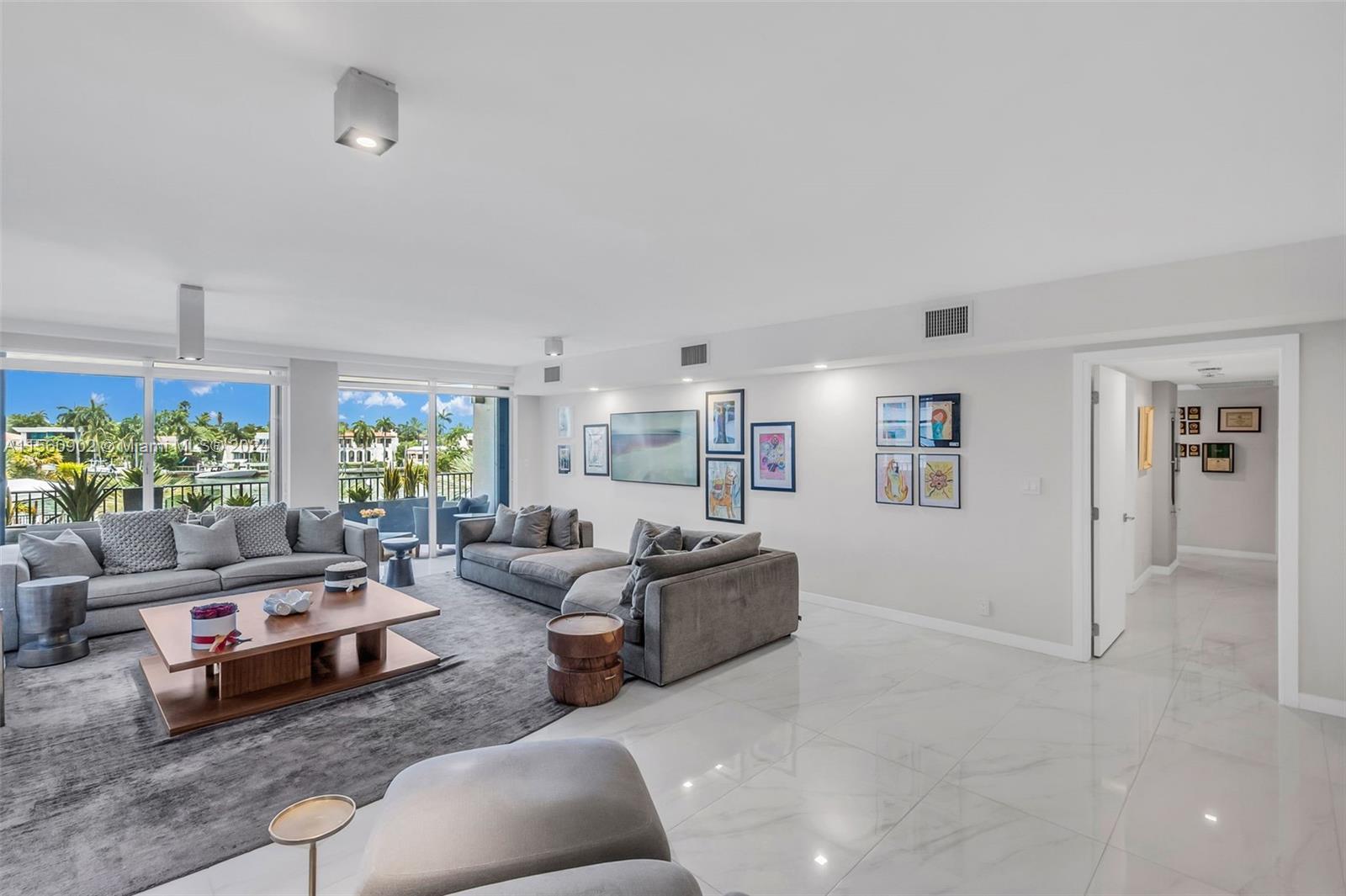 Enjoy this dream oasis in the heart of Miami Beach! Stunning corner condo with exclusive waterfront 