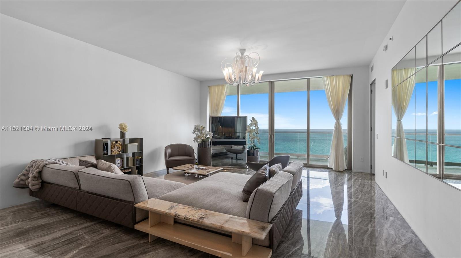 This gorgeous oceanfront condo at one of the top luxury buildings in Sunny Isles boasts more than 30