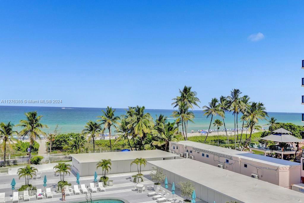 Experience the awe-inspiring beach and ocean views from this sprawling Miami Beach haven. With the b