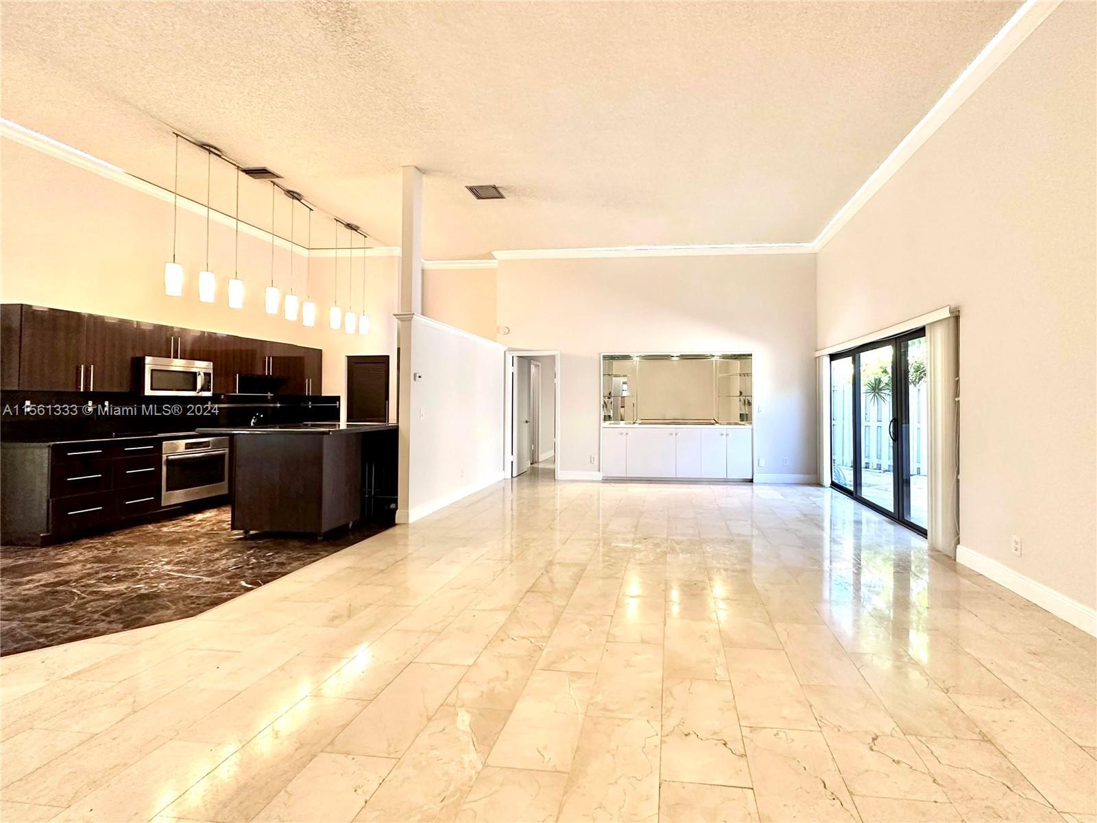 Welcome to a refined 3Beds / 2Baths haven in Hallandale Beach. This timeless residence boasts a spac
