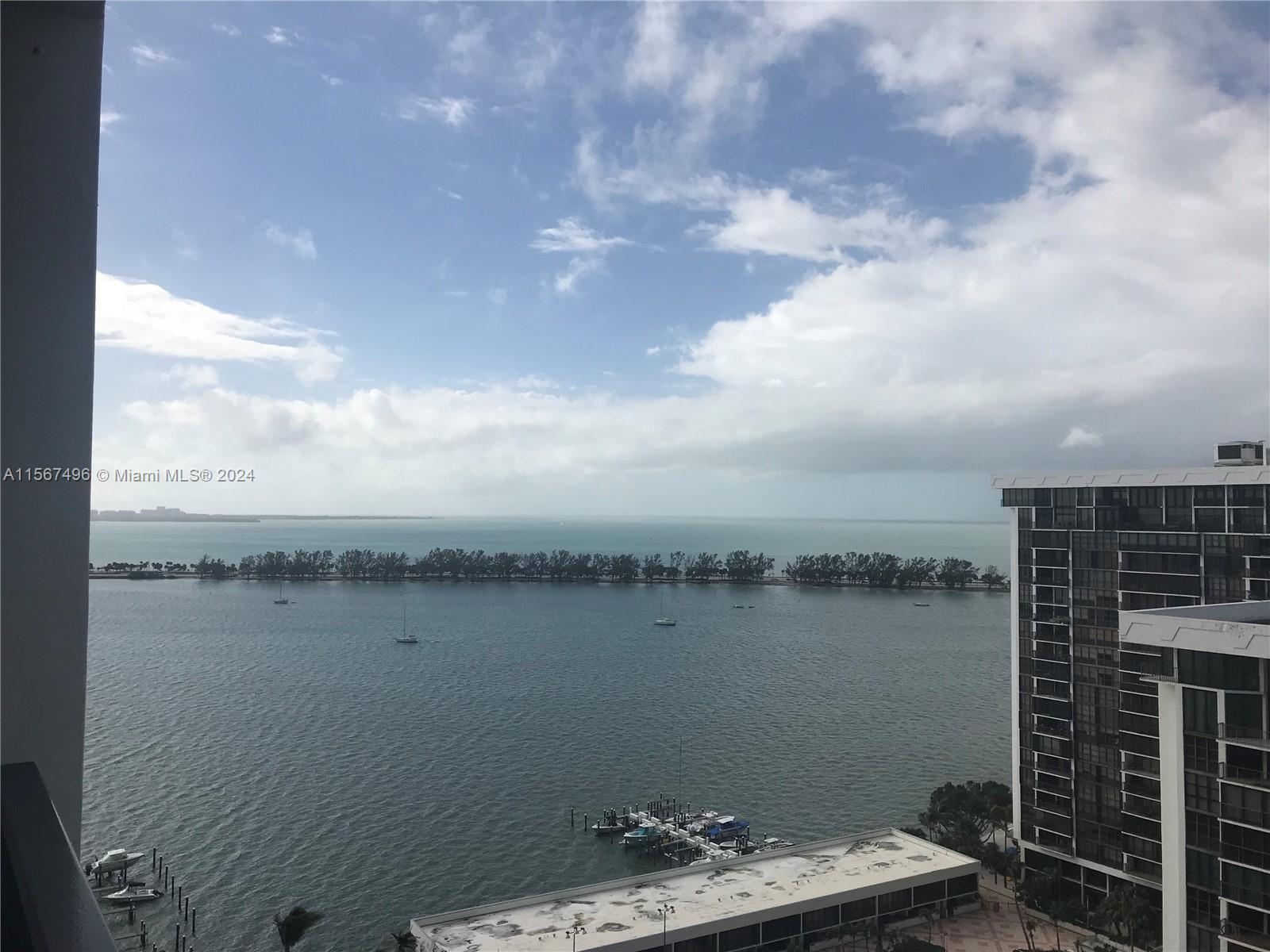 Enjoy breathtaking bay and city views in this 1 bedroom / 1.5 baths unit in the heart of Brickell! V