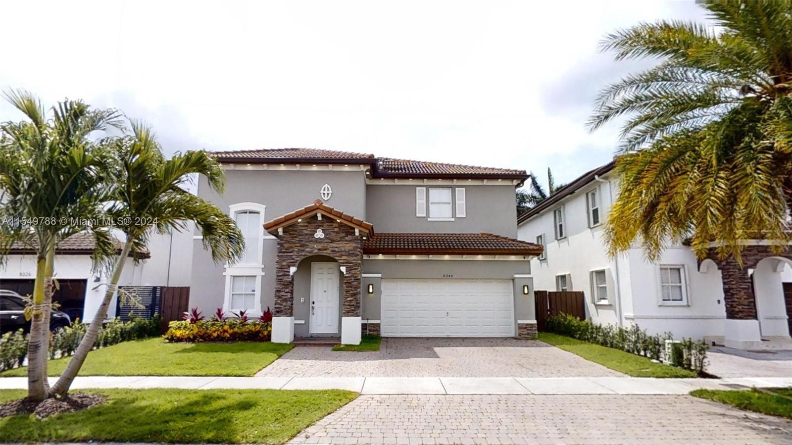 Stunning Two-Story single family home in the most exclusive community, Menorca in Isle at Doral. Thi