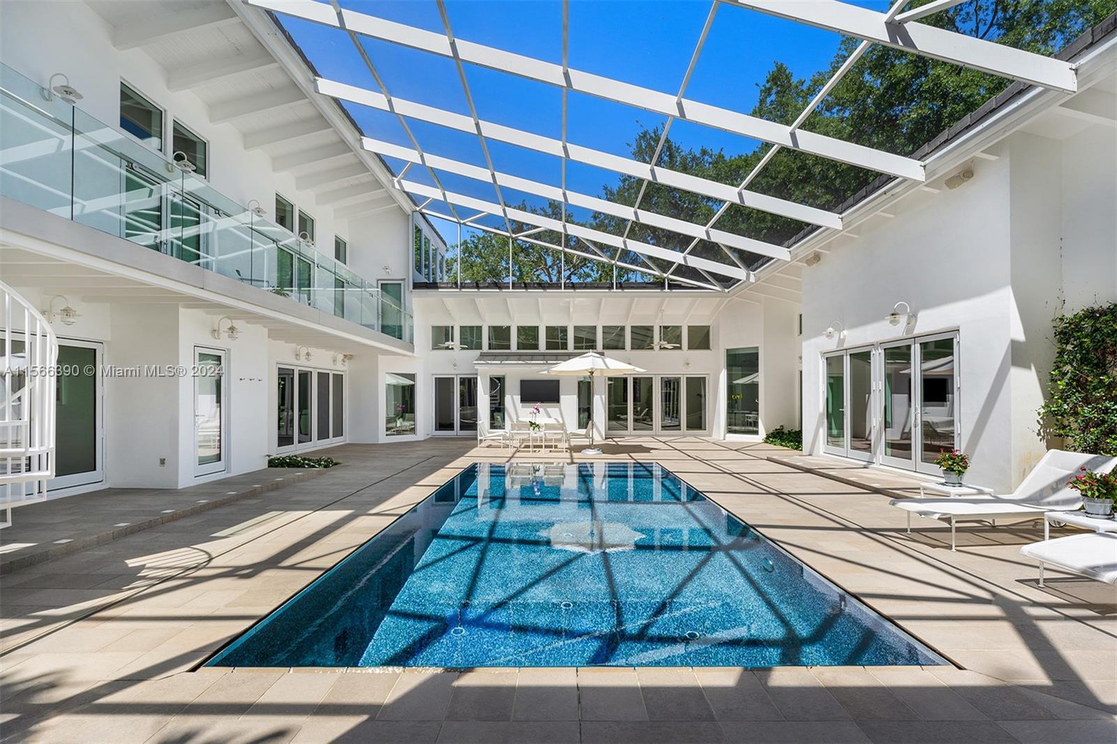 Completely renovated Mid-Century modern estate in "The Moorings" Coconut Grove gated community, with
