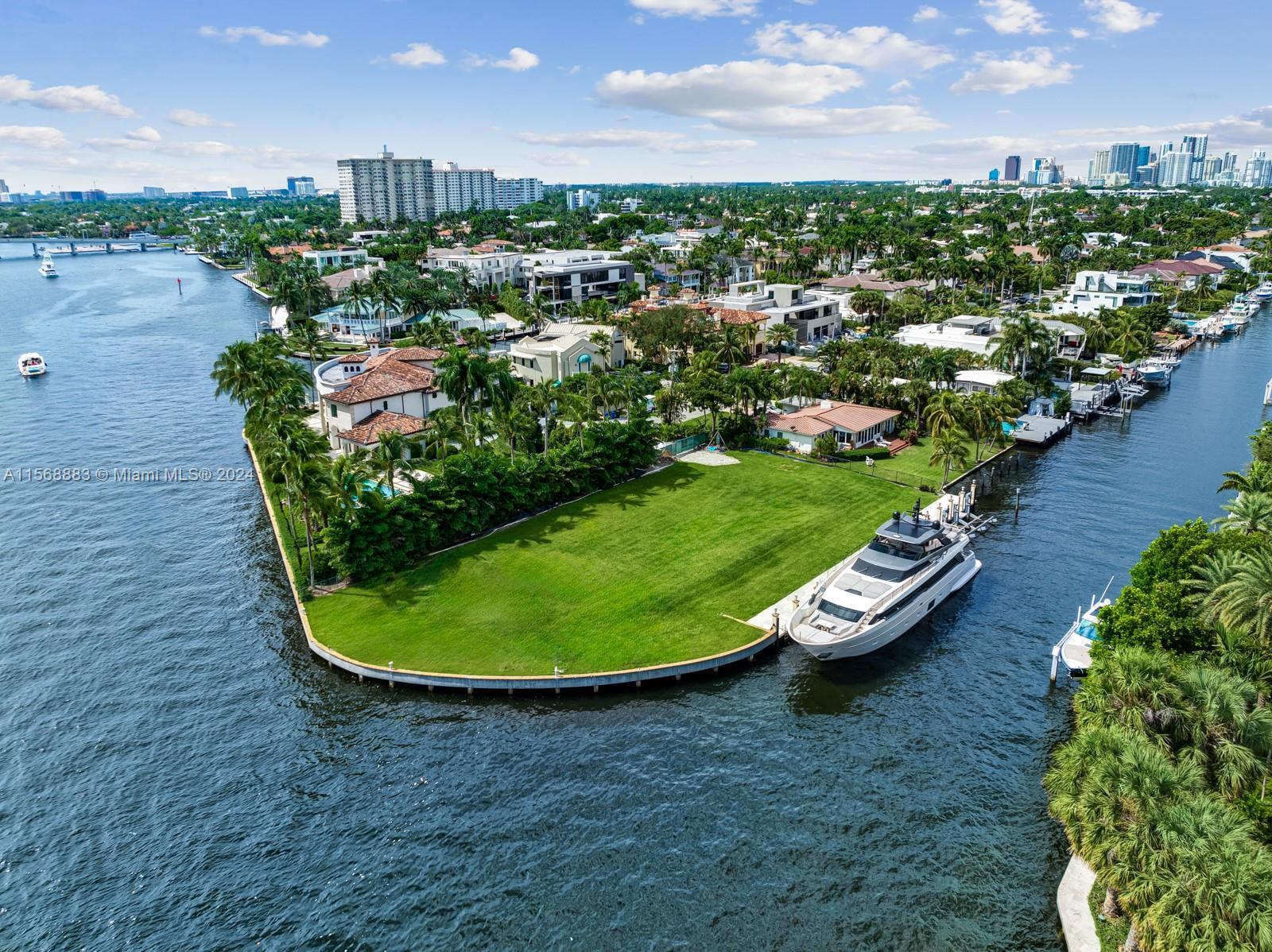 Rare Intracoastal point lot! Incredible building opportunity in the highly desirable Seven Isles com