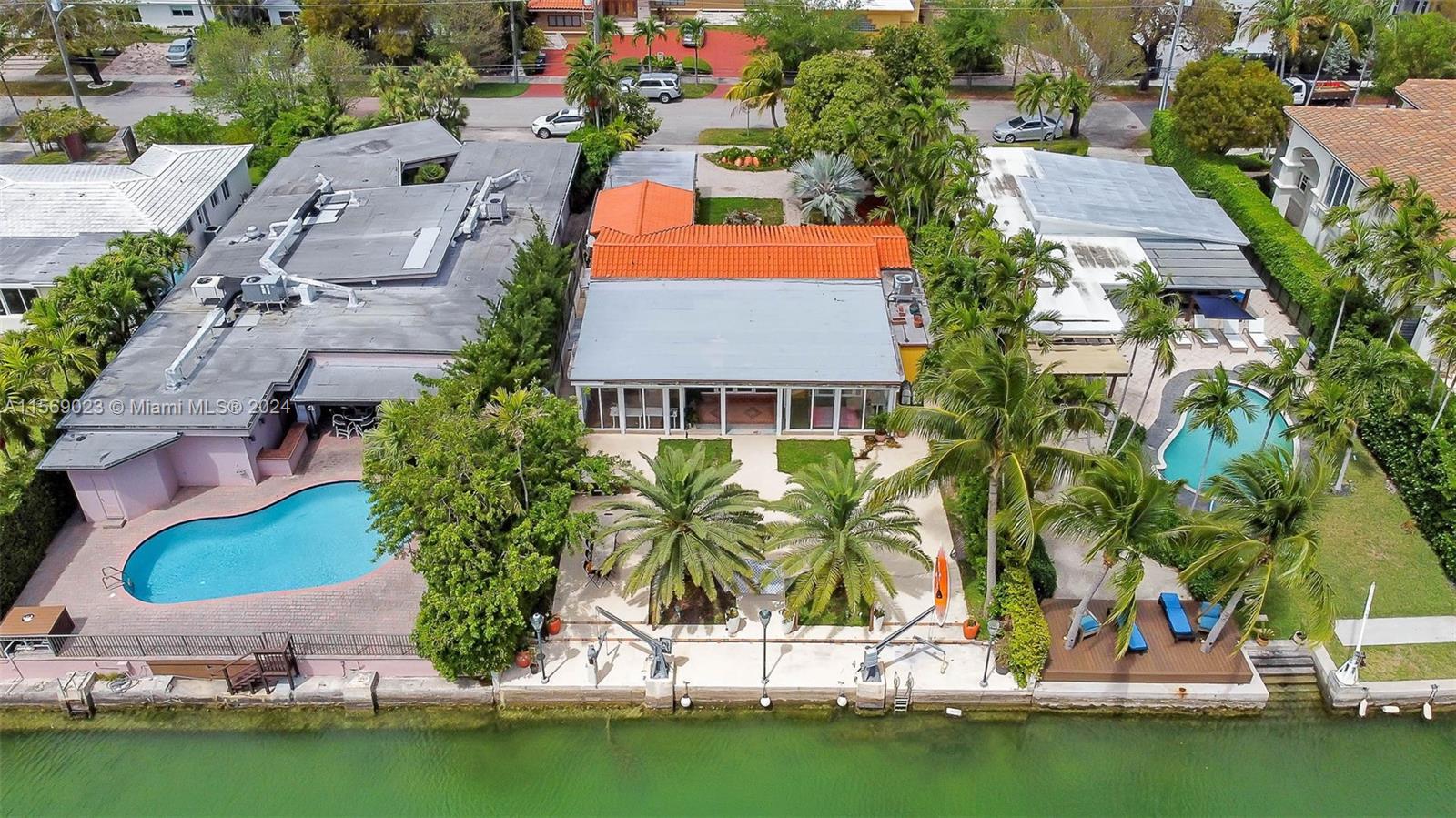 Exquisite waterfront residence in Biscayne Point. Distinctive home featuring 5 bedrooms, 4 bathrooms