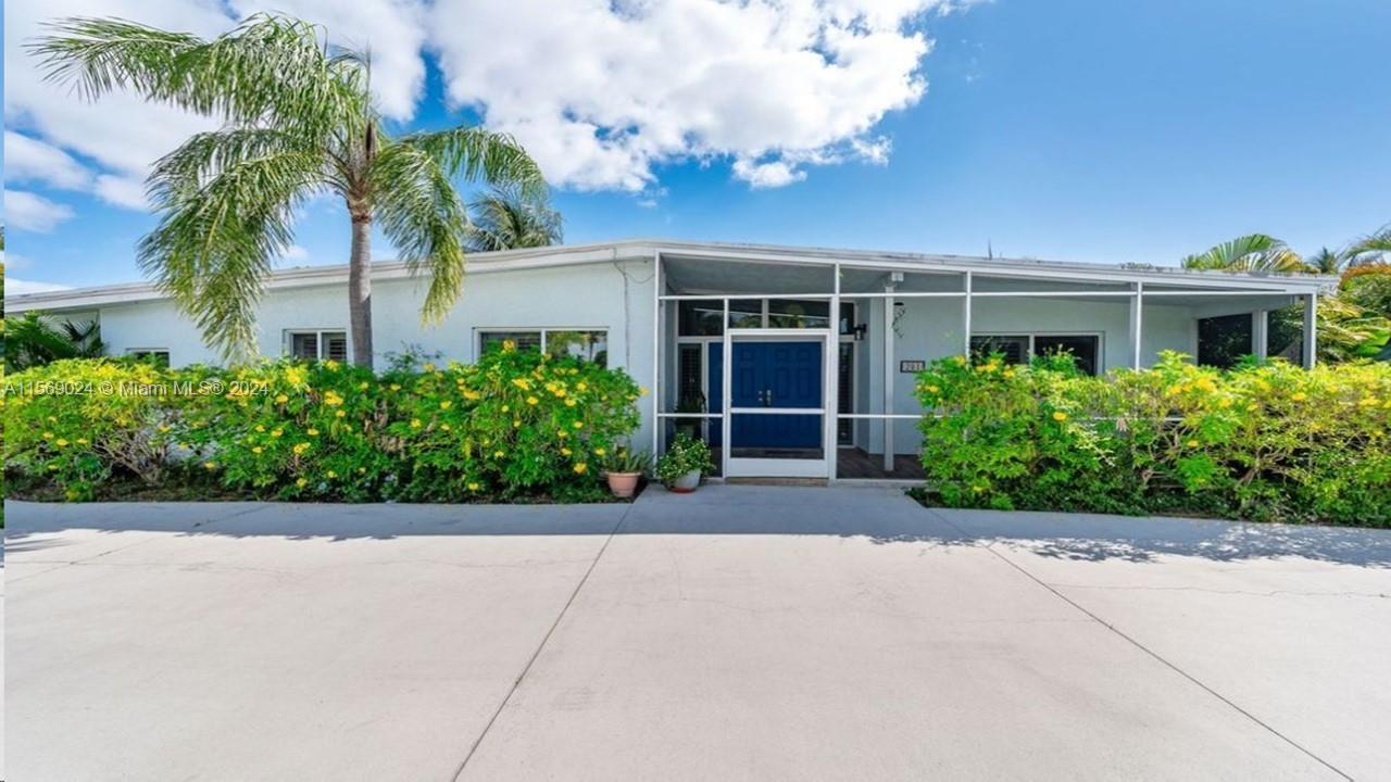 Spacious updated large corner lot home in the heart of Deerfield Beach, with spacious 3 Bedrooms, 2 