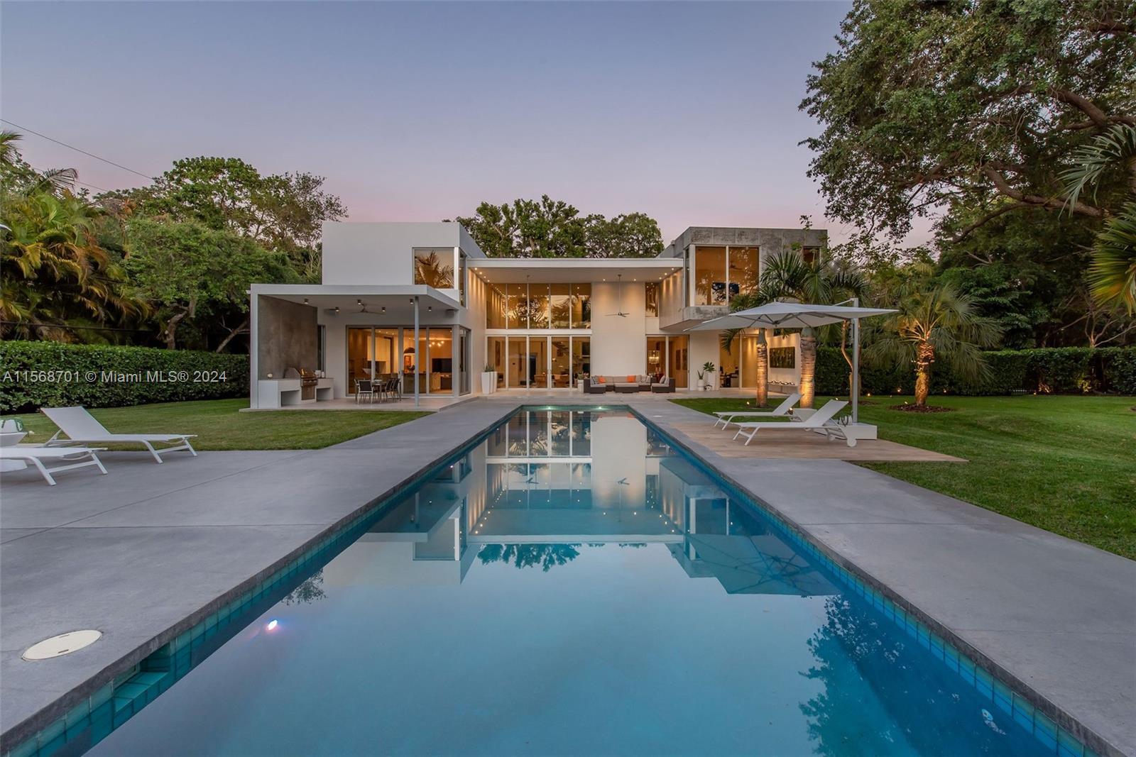 A contemporary masterpiece in the sought-after neighborhood of Pinecrest. This Bauhaus style propert