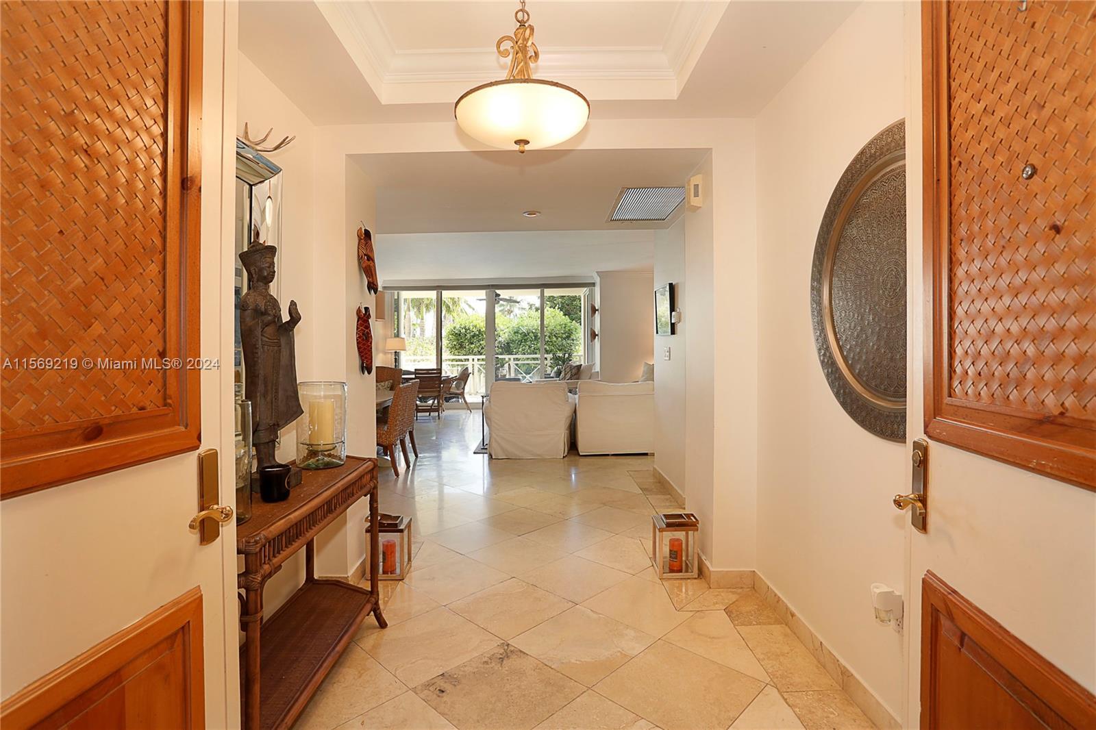 Best priced unit in Grand Bay!! Double door entrance leads you to the foyer and lovely 2 bedrooms 2 