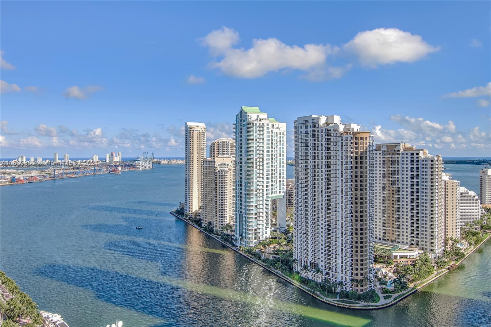 One of the best condo buildings on Brickell Key with water and city views. The unit has high ceiling