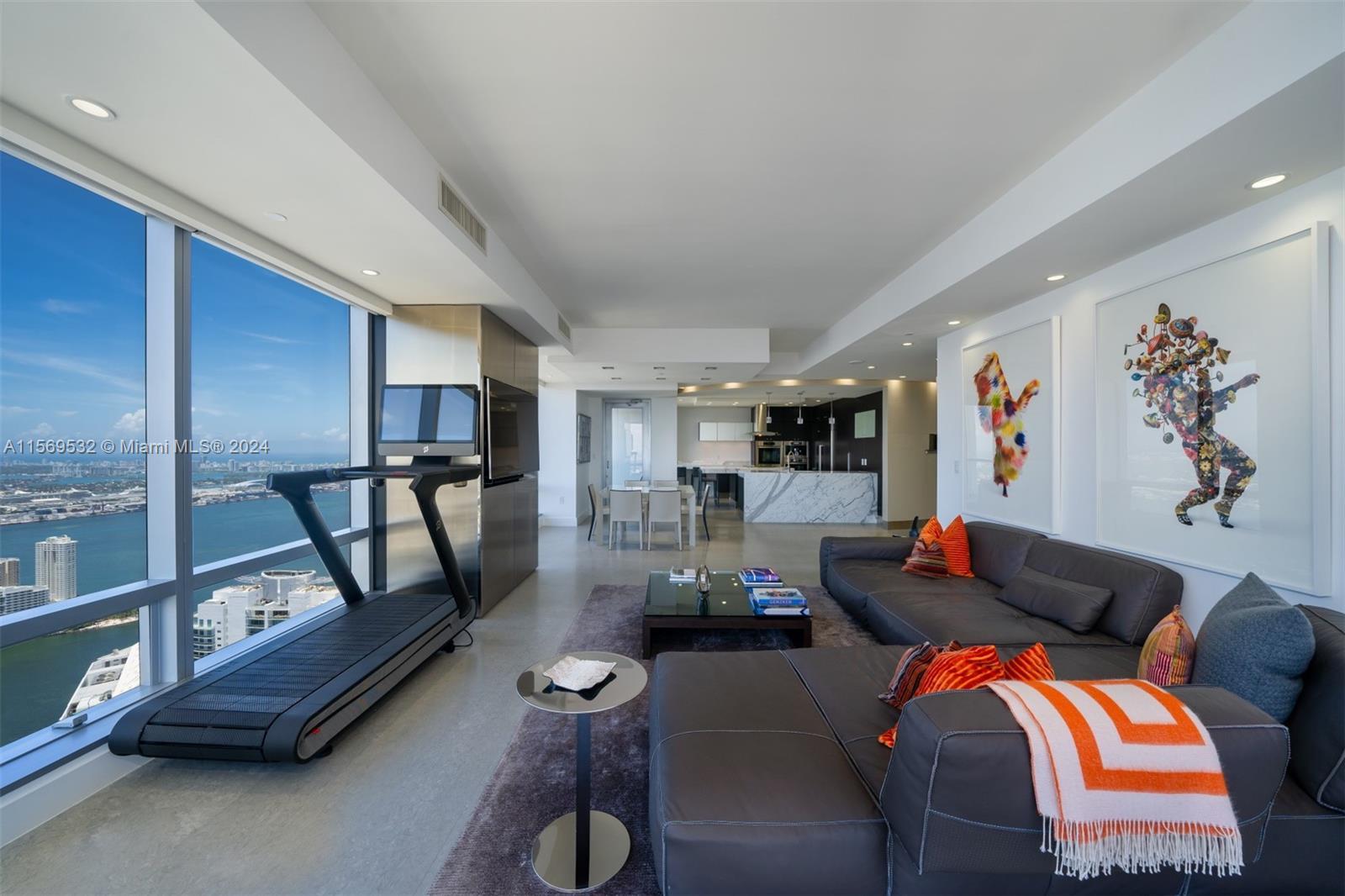 Stunning penthouse on the 69th floor at prestigious Four Seasons Residences Miami. This masterpiece 