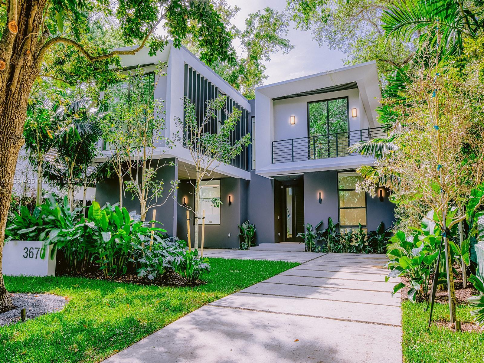 Nestled in the vibrant Coconut Grove neighborhood of Miami, this home offers a quintessential blend 