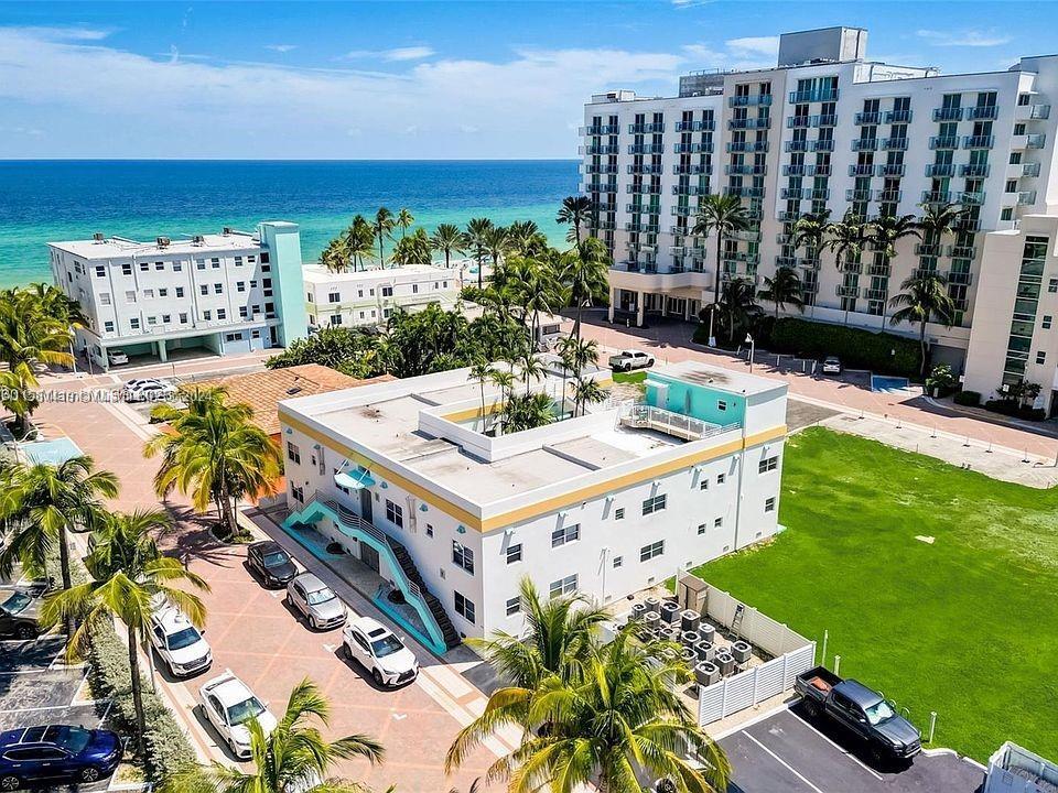 Enjoy paradise on Hollywood Beach.  This boutique gated community is steps from the shore. 40 year i