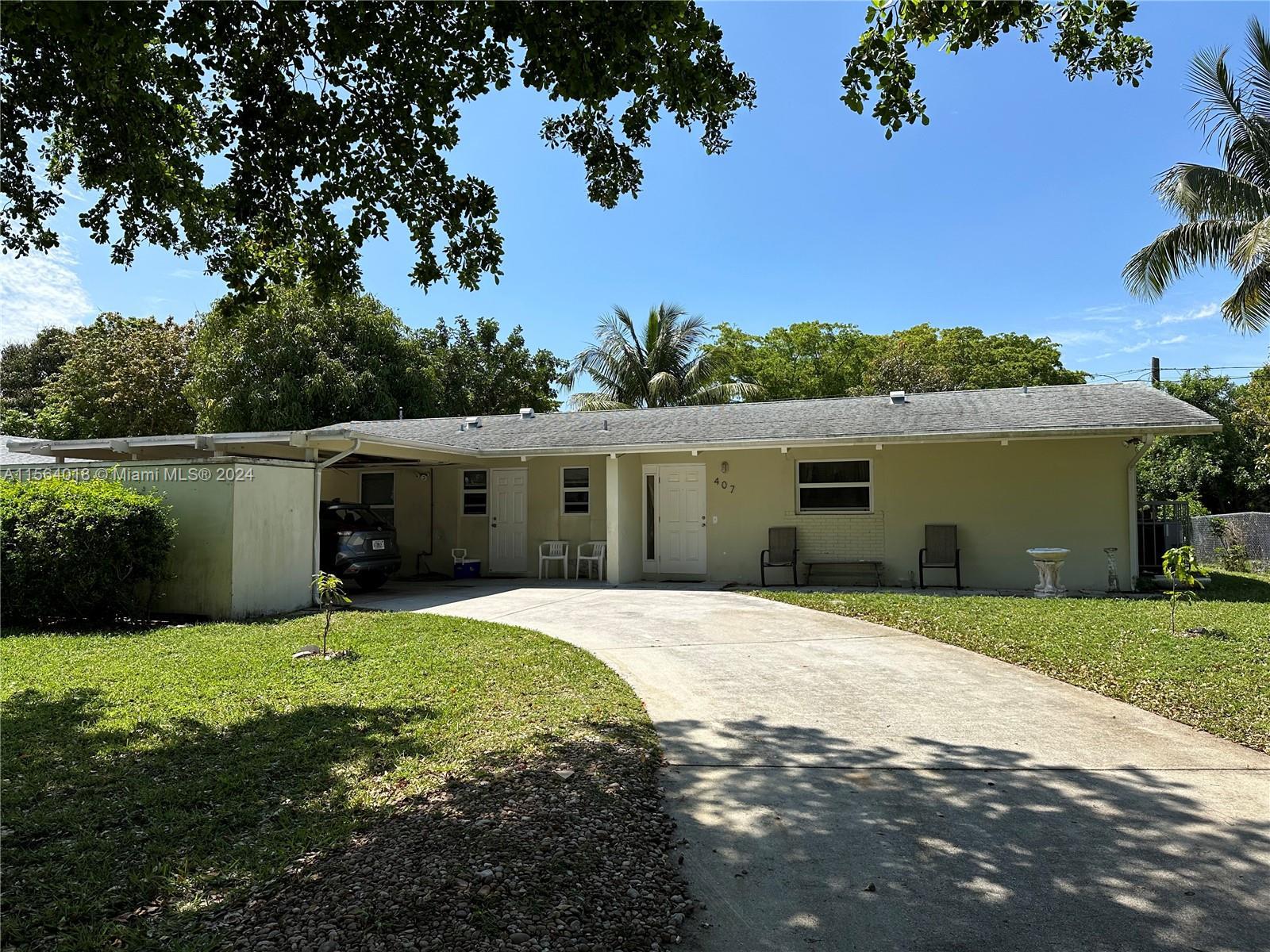 Beautifully maintained home in the quiet, peaceful neighborhood of Palm Beach Lakes. Last renovated 
