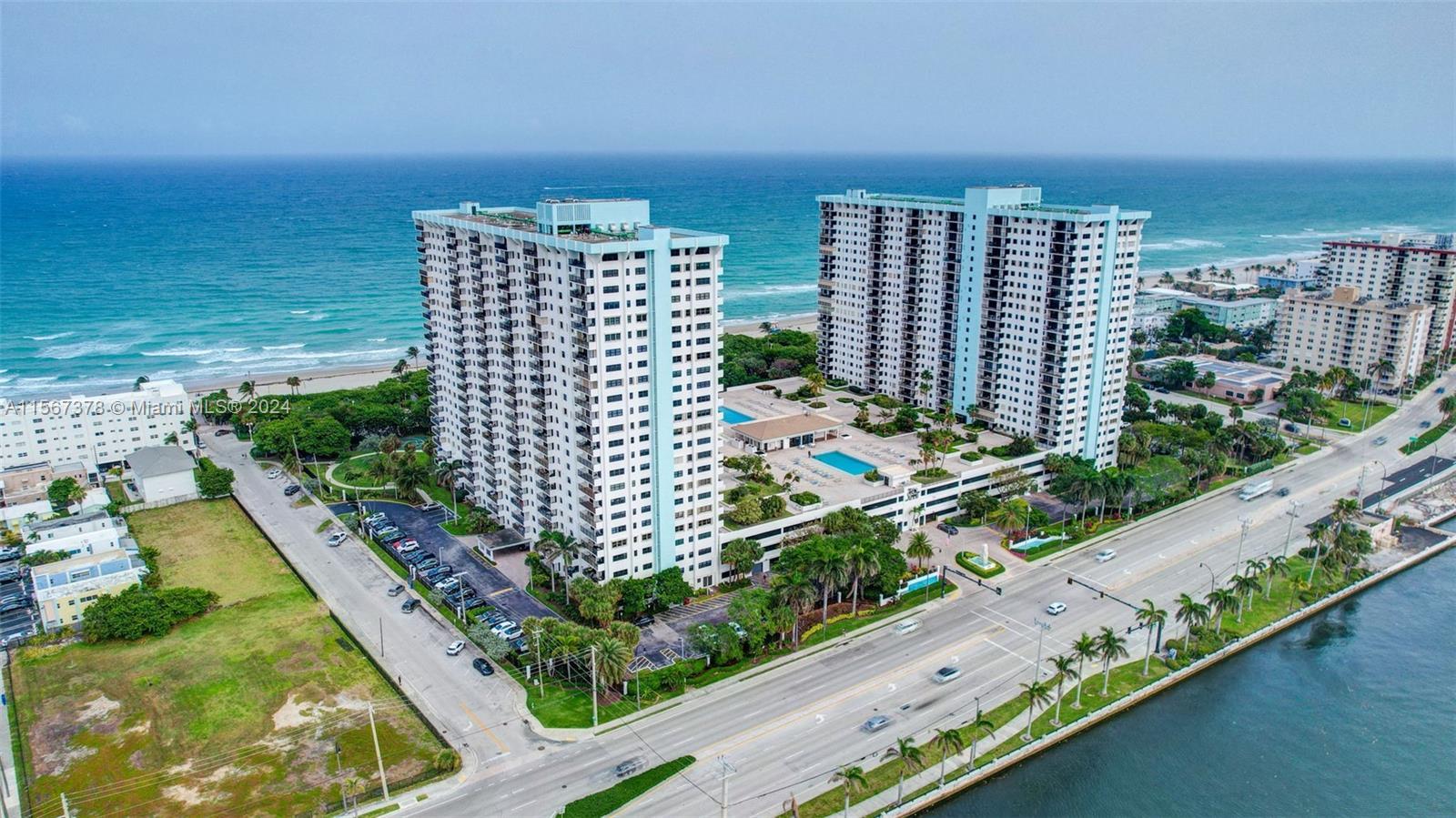 Indulge in oceanfront living with direct beach access & panoramic intracoastal views. This Summit To