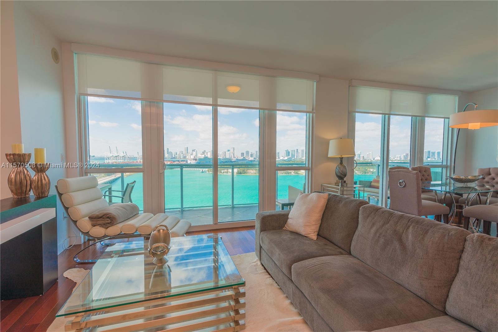 Enjoy a spectacular wide bay view of the Miami Skyline in this gorgeous 1 bedroom and den with 2 ful