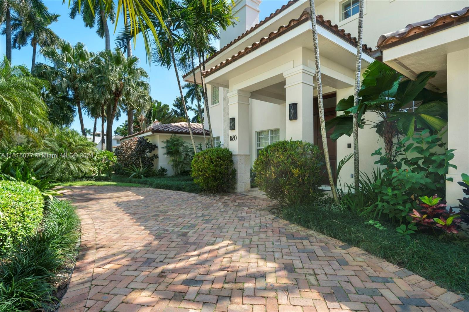 Elegant family home on prestigious Sunset Island II. The home was completely rebuilt in 2003 and has