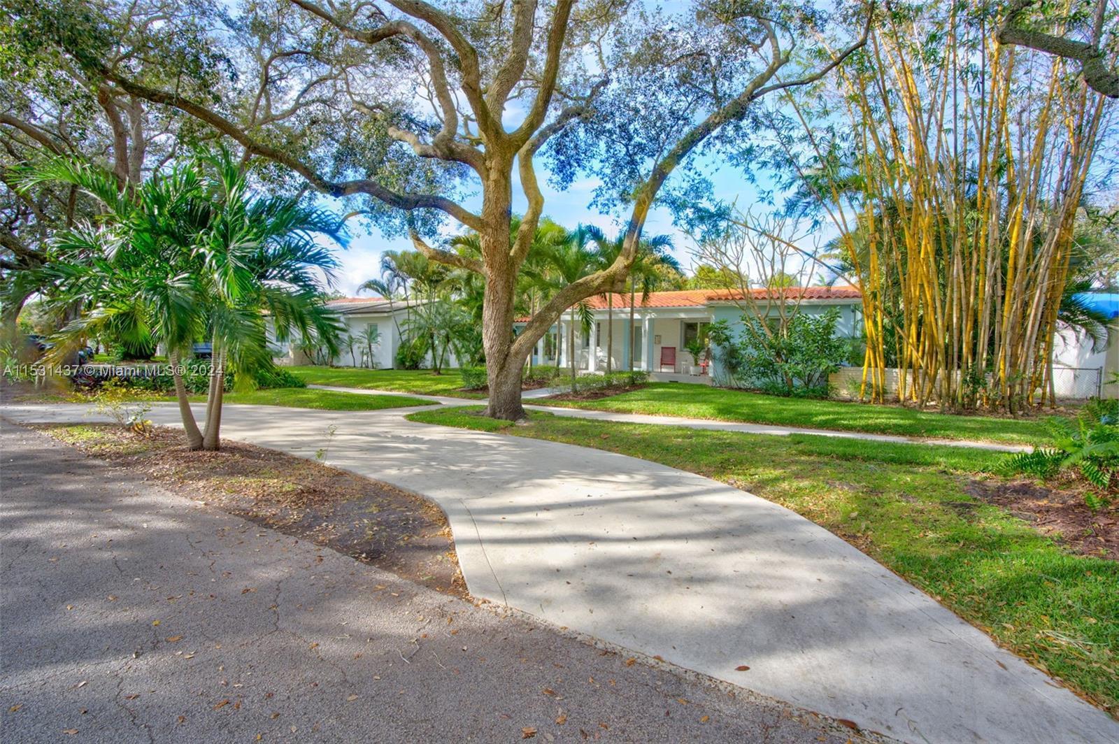 Prime opportunity to own a Miami Shores home with old-world charm & updated classic lines. Split-des