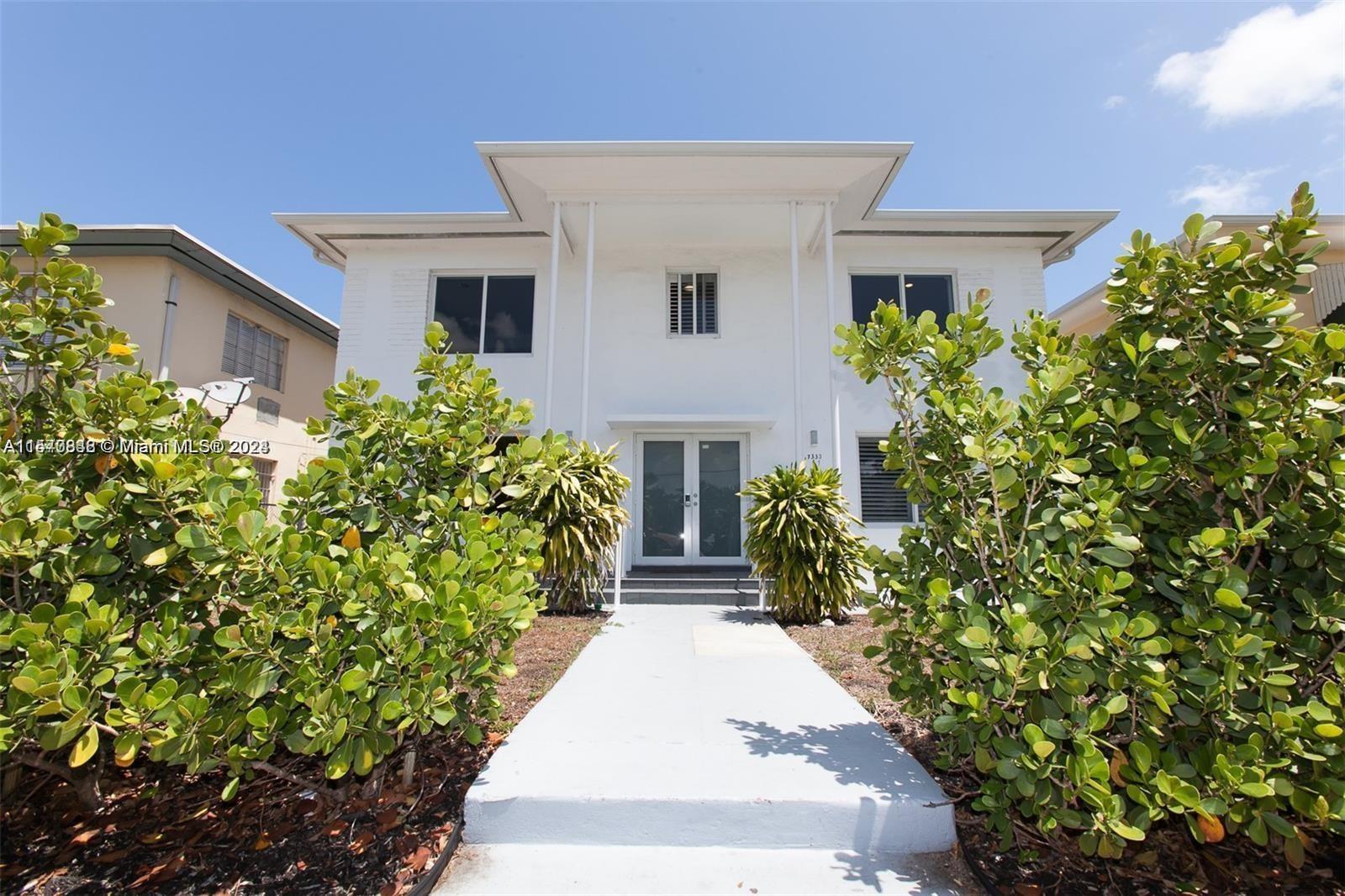 Welcome to this stunning contemporary triplex in a prime Miami Beach location, just across from Gard