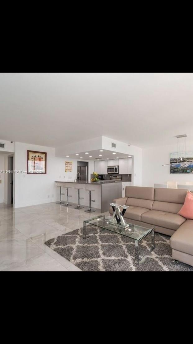 In high demand North Tower  at Turnberry way. Contemporary turnkey, remodeled condo 1 bedroom can be