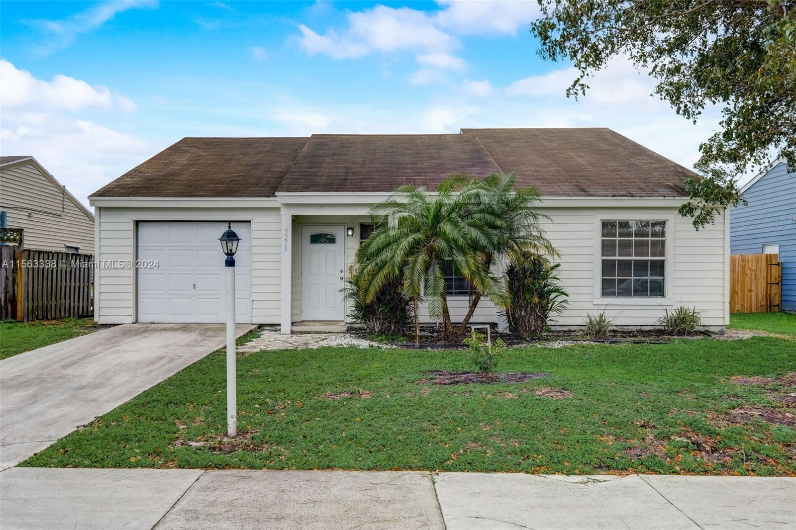 Welcome to your new oasis in Lake Worth! This home boasts a spacious 3-bed,2-bath As you step inside