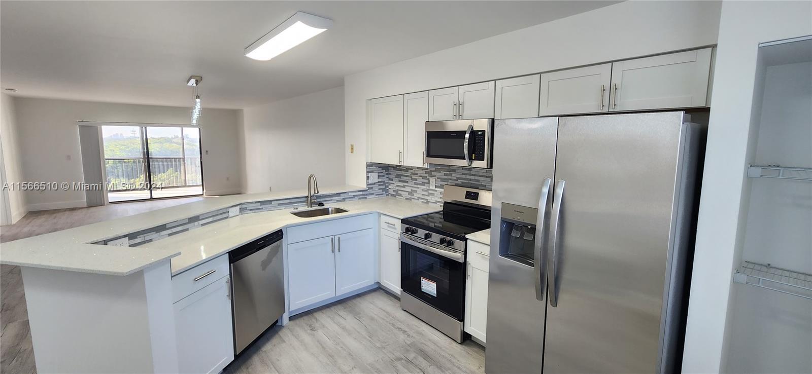 A MUST SEE! Immaculate fully remodeled 2/2 Condo in Pompano Beach. Beautiful cabinets, Quartz counte