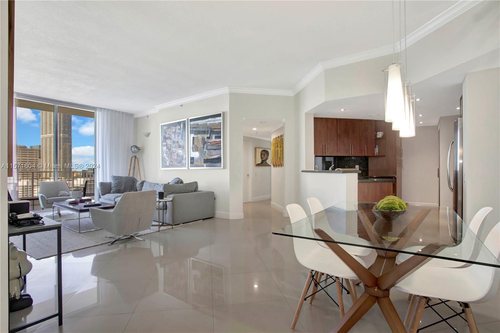 Spectacular Penthouse at Courvoisier Brickell Key. This spacious 3 bed/2.5 bath unit laid out over 1